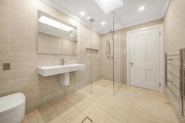 A Bathroom with A Toilet , Sink , Mirror and Walk in Shower | Mid-North Coast, NSW | BDM Constructions