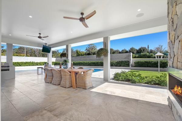 A Patio with A Table and Chairs and A Ceiling Fan | Mid-North Coast, NSW | BDM Constructions