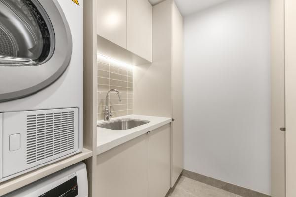 A Laundry Room with A Washer and Dryer and A Sink | Mid-North Coast, NSW | BDM Constructions