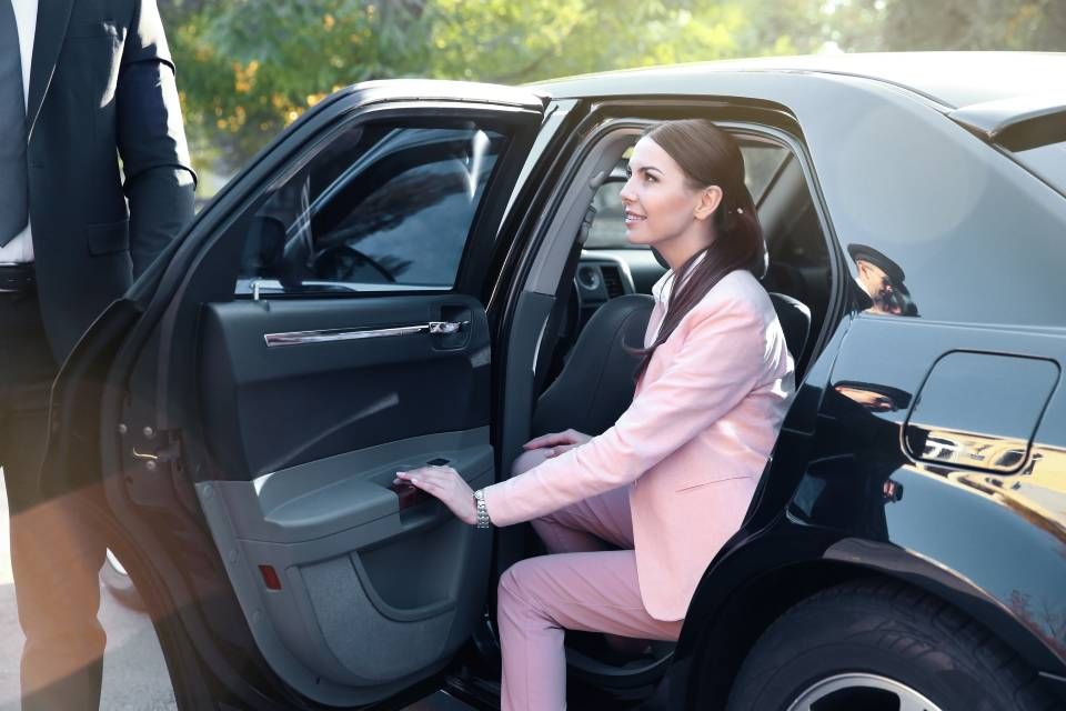 Lady getting out of car