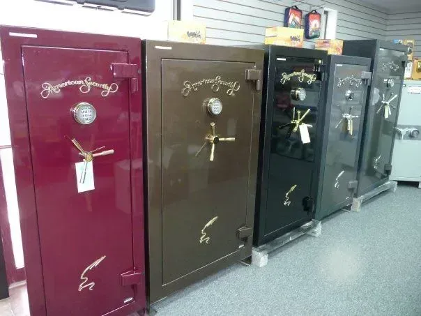 Row of large, colorful safes in a store.