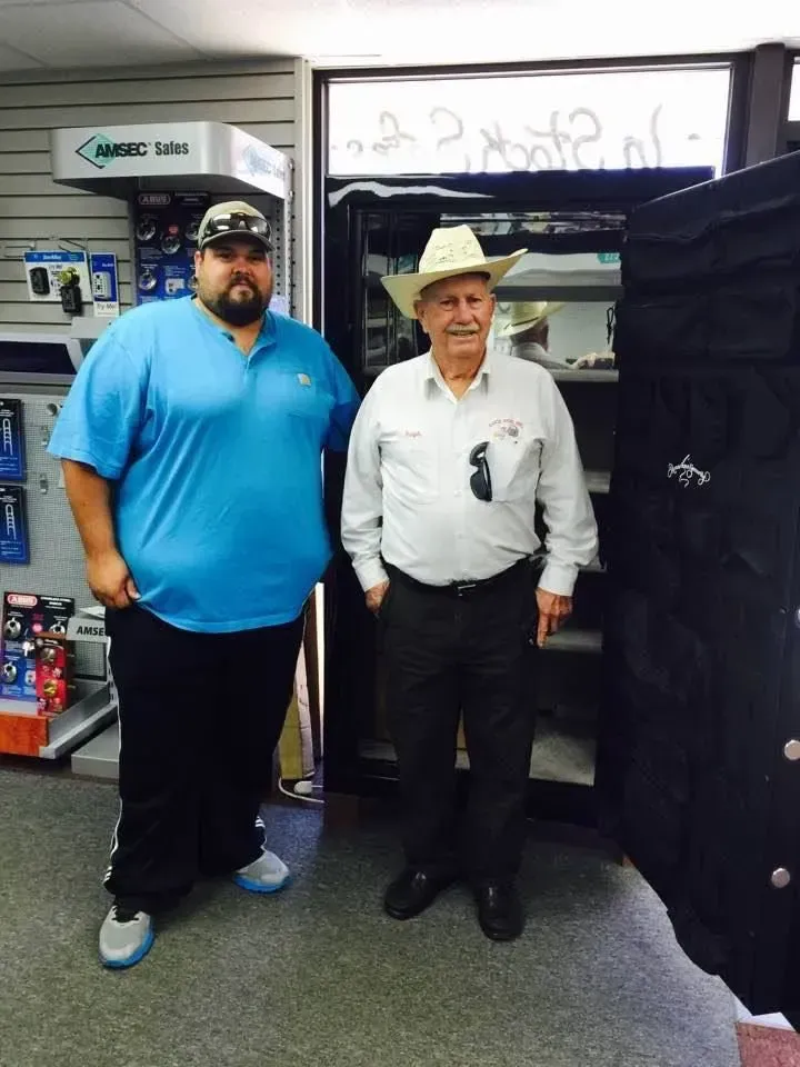 Two men stand side by side in a store.