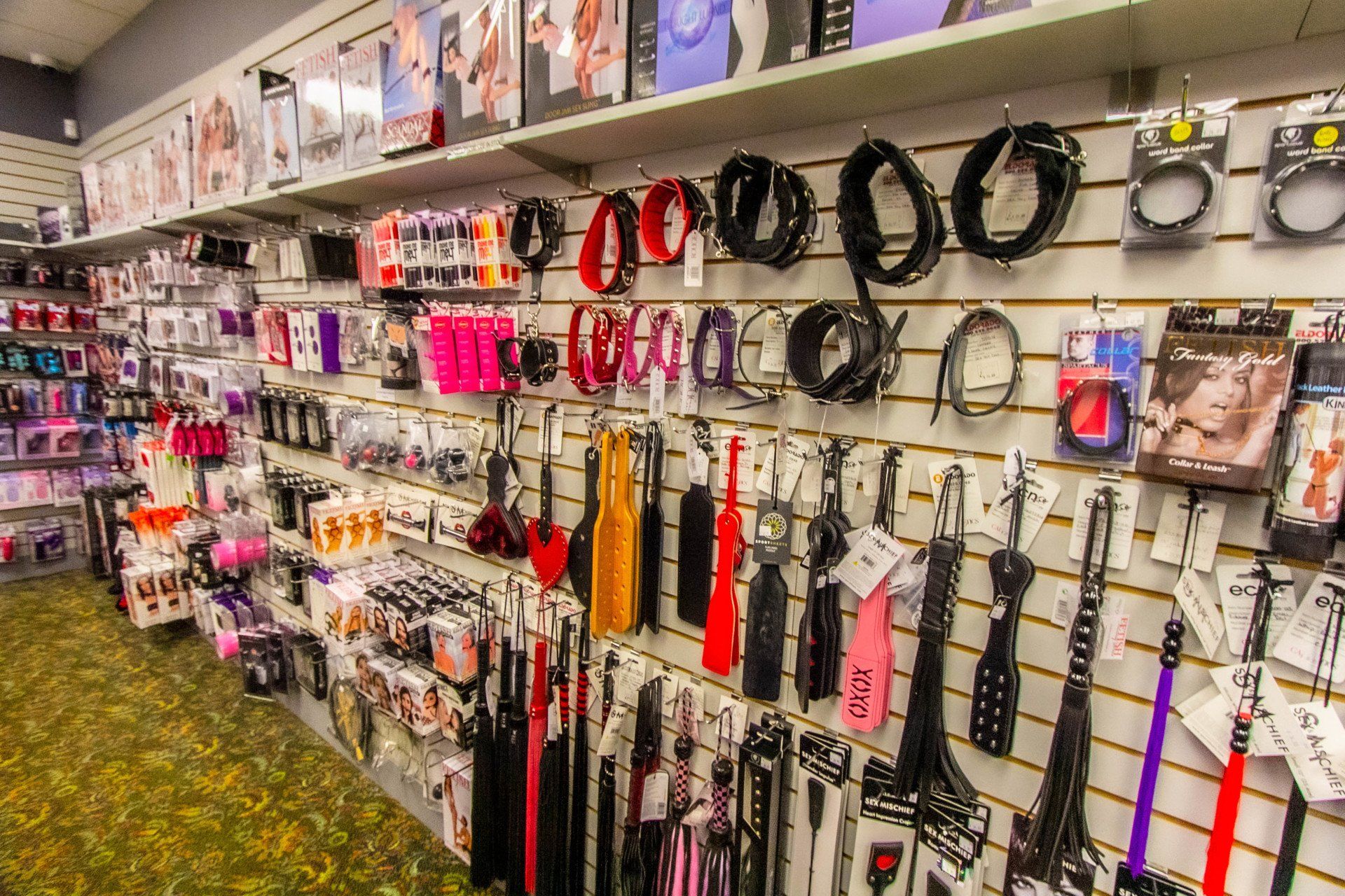 shelf of bondage gear in sex shop