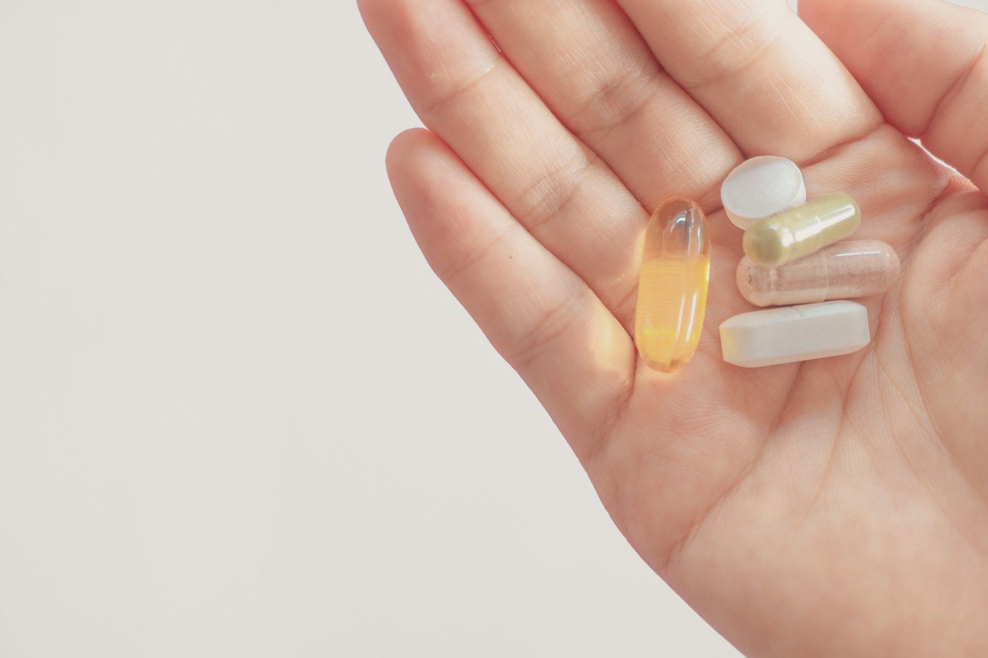 Holding Tablets and Capsules | Evansville, IN | Winiger Chiropractic