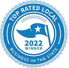 A blue seal that says top rated local business in the state