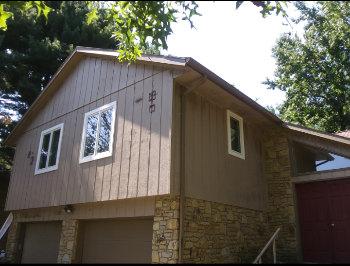 A house with a roof that has the number 40 on it