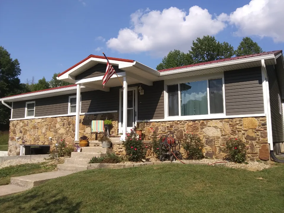 A house with a flag on the front porch