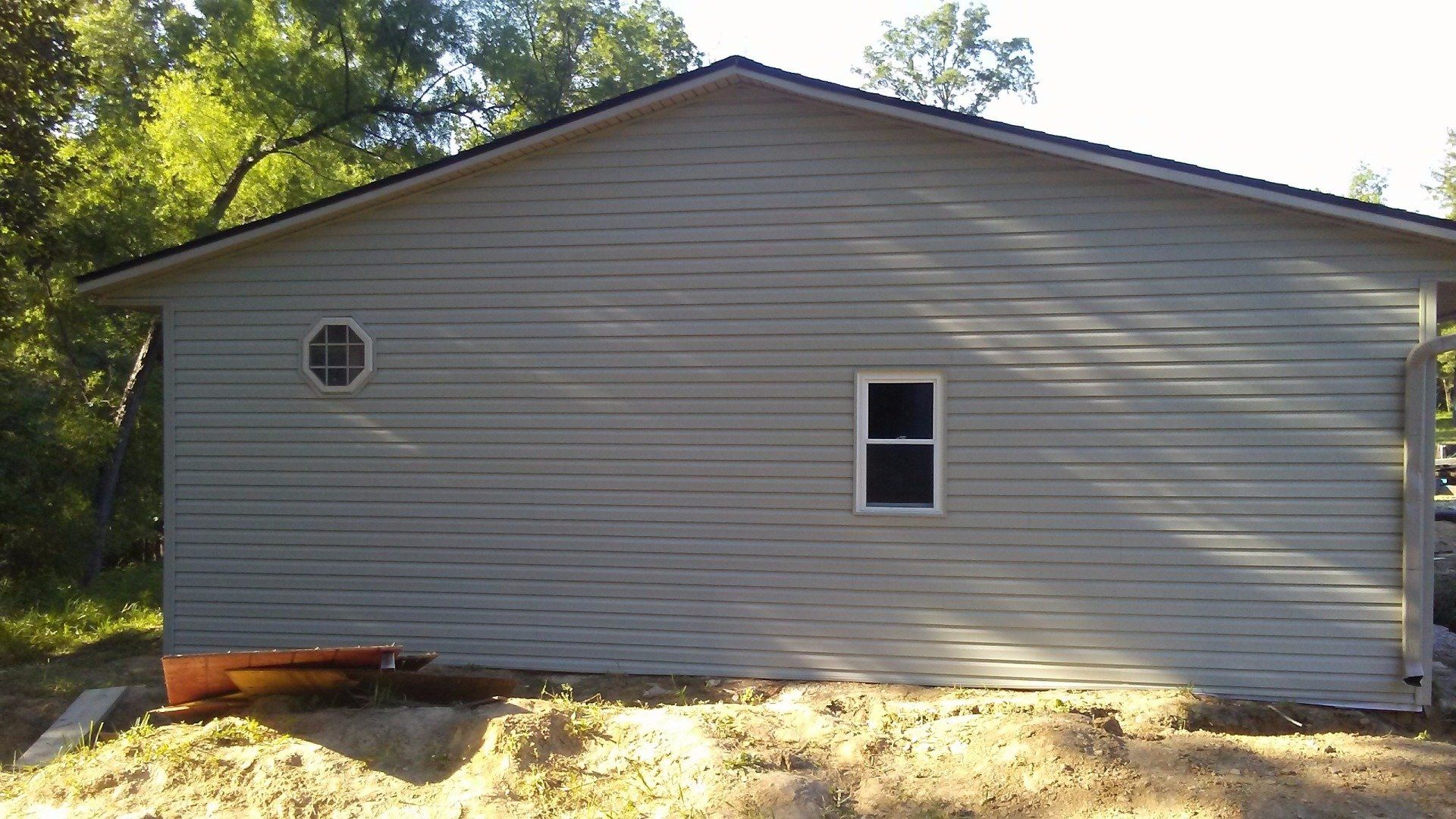 A house with a window on the side of it