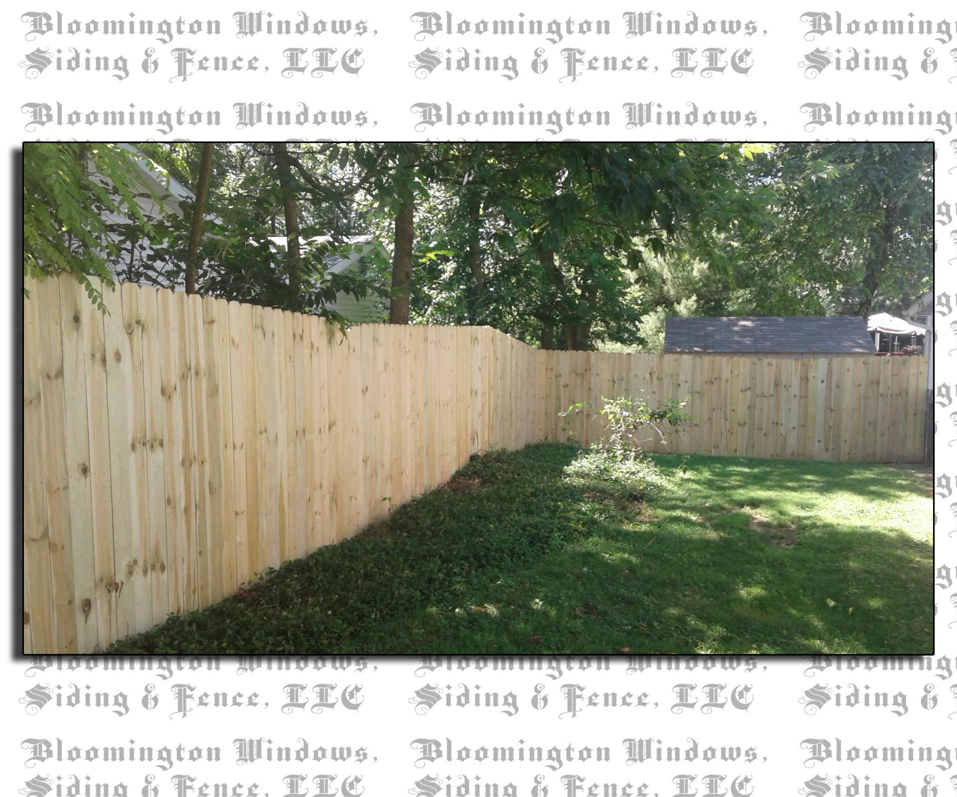A picture of a wooden fence taken by bloomington windows
