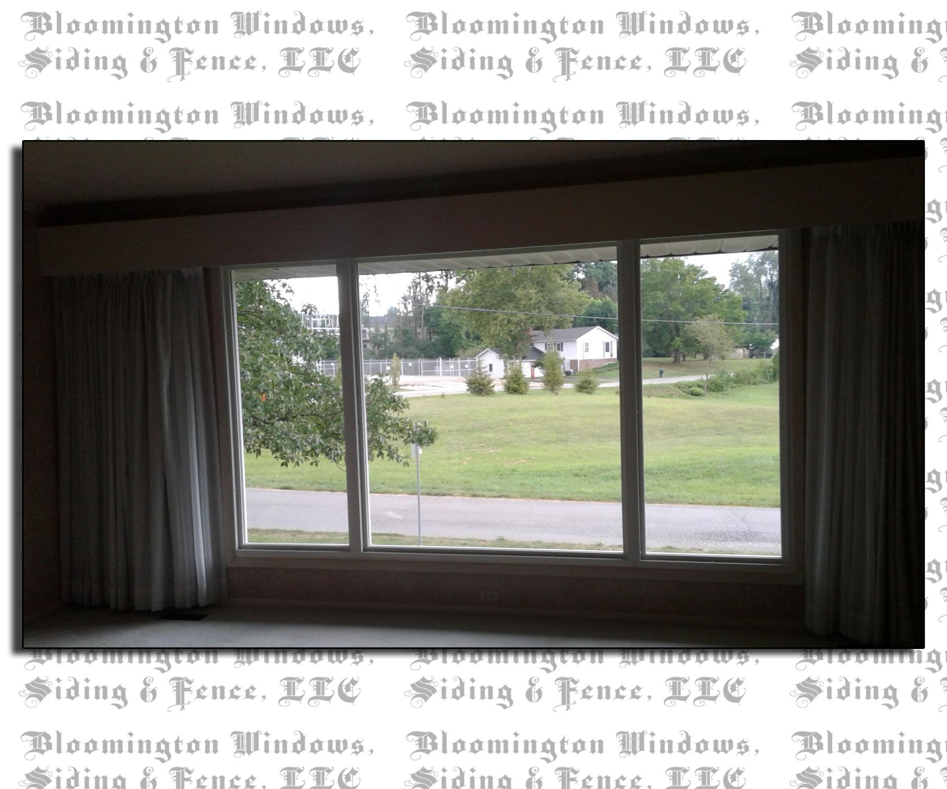 A picture of a window with the words bloomington windows on it