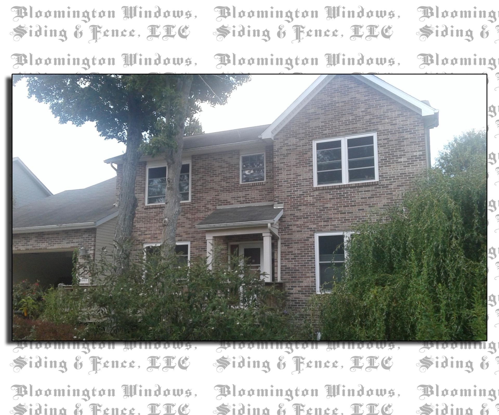 A picture of a house with the words bloomington windows on it