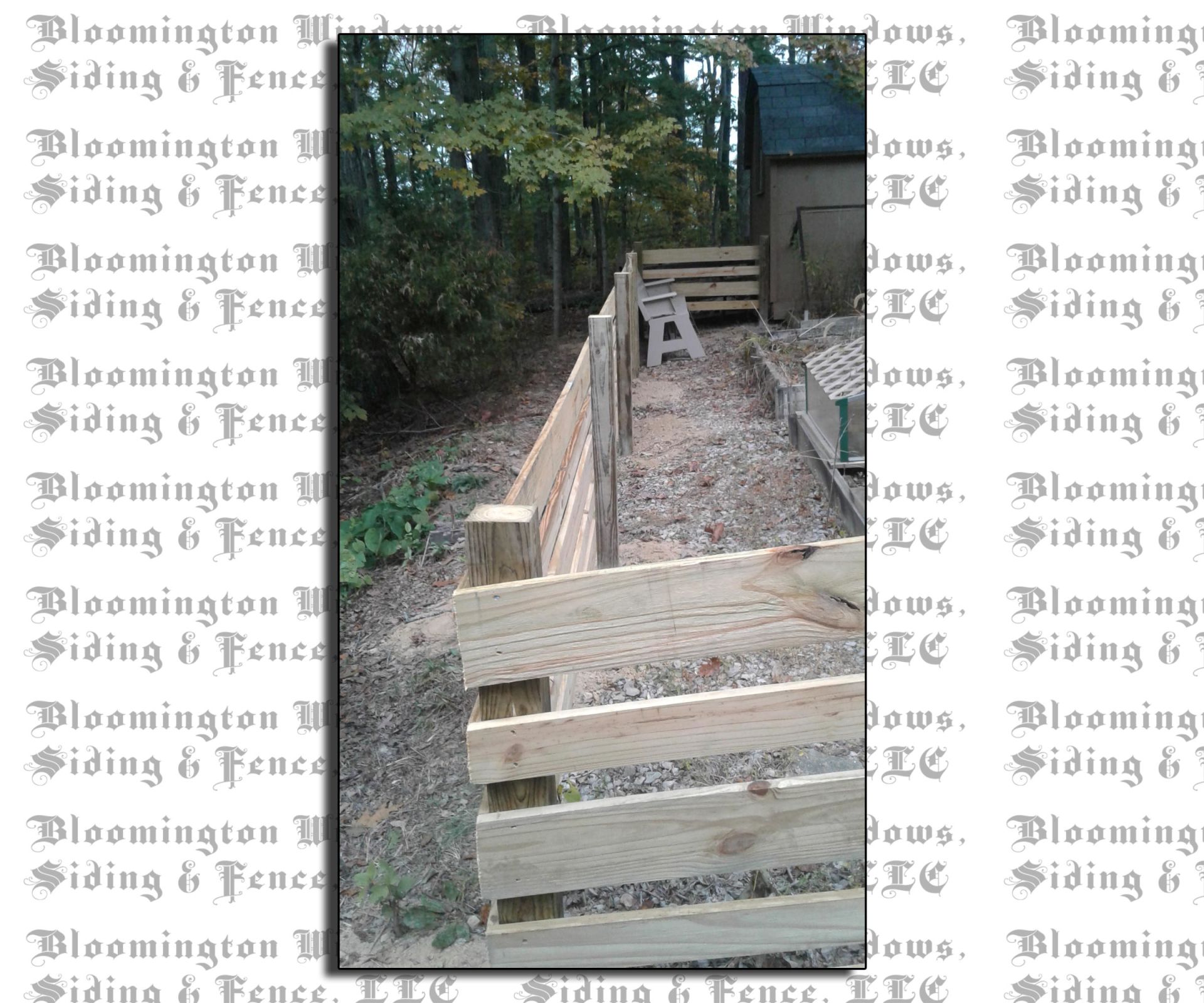 A picture of a wooden fence with the words bloomington siding & fence on it