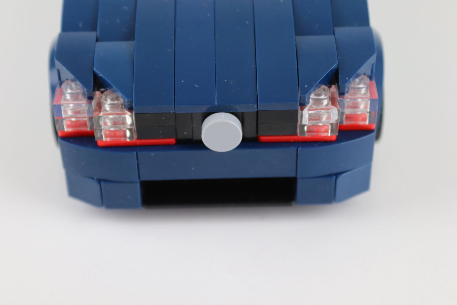 LEGO golf GTI donker blauw lego minifugure schaal