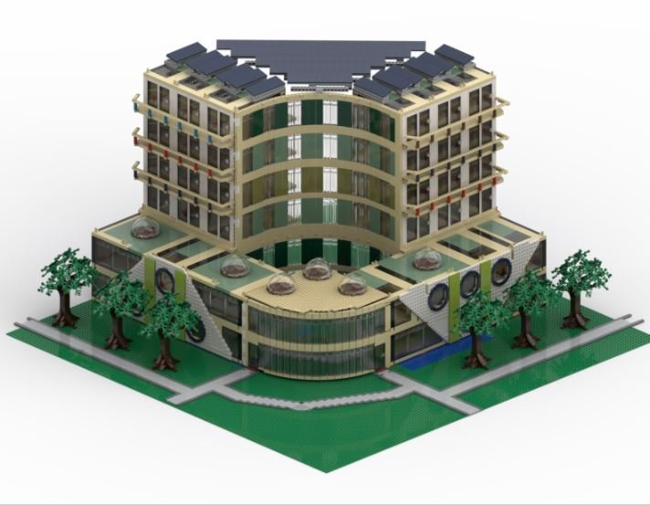 Een legomodel van een gebouw met bomen ervoor