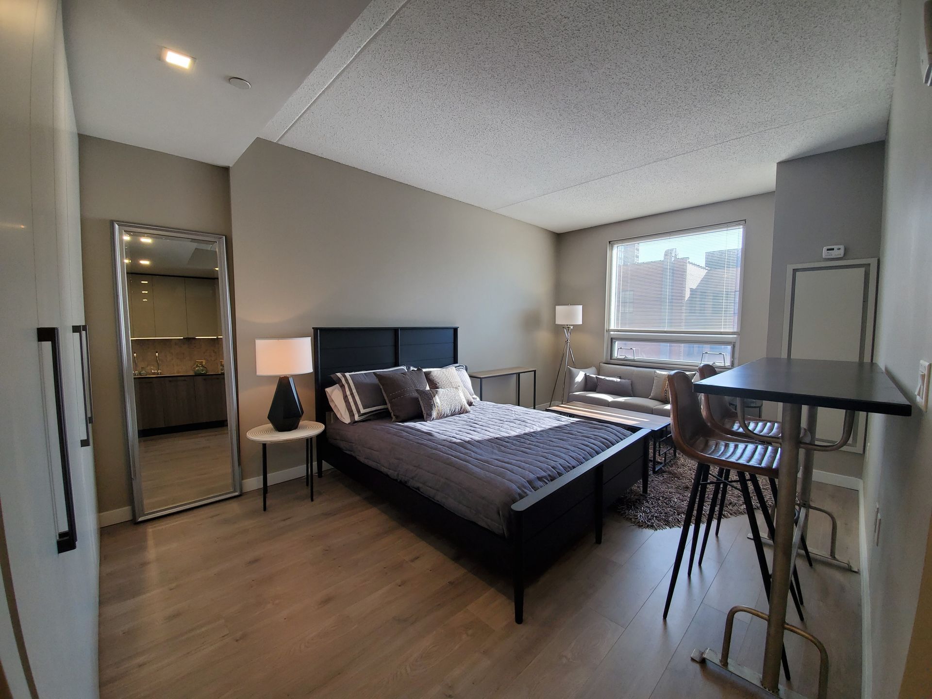 There is a large bed in the middle of the room.