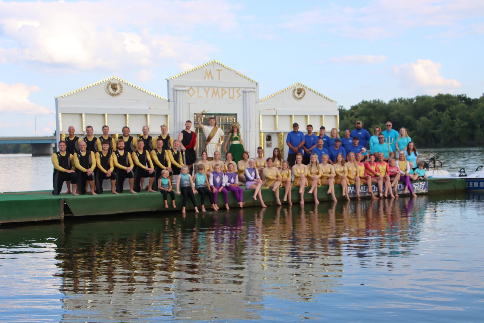 A group of people standing on a dock