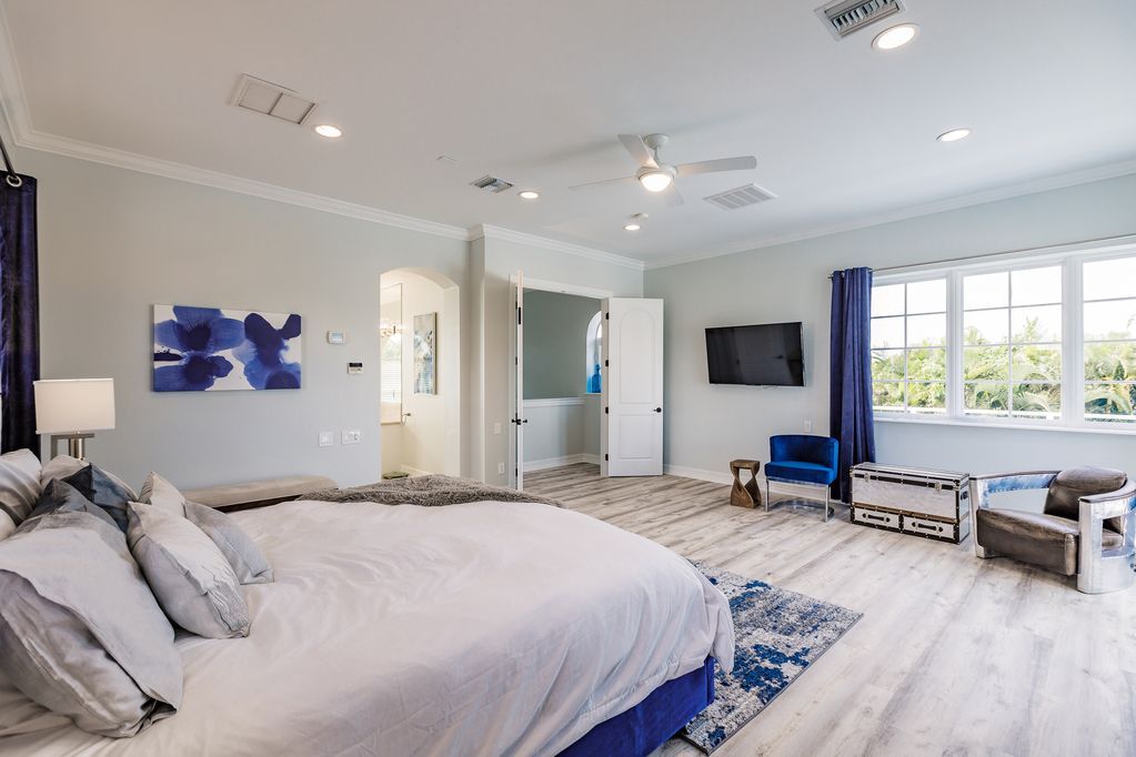 There is a large bed in the middle of the room.