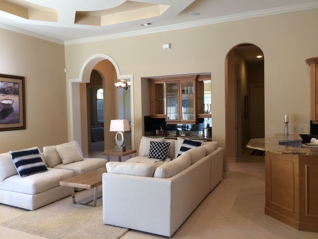 A living room with a couch and a table in it