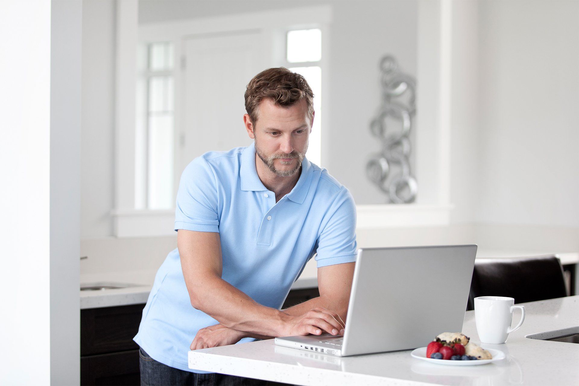 Man Looking at His Laptop — Melville, NY — All Access Financial
