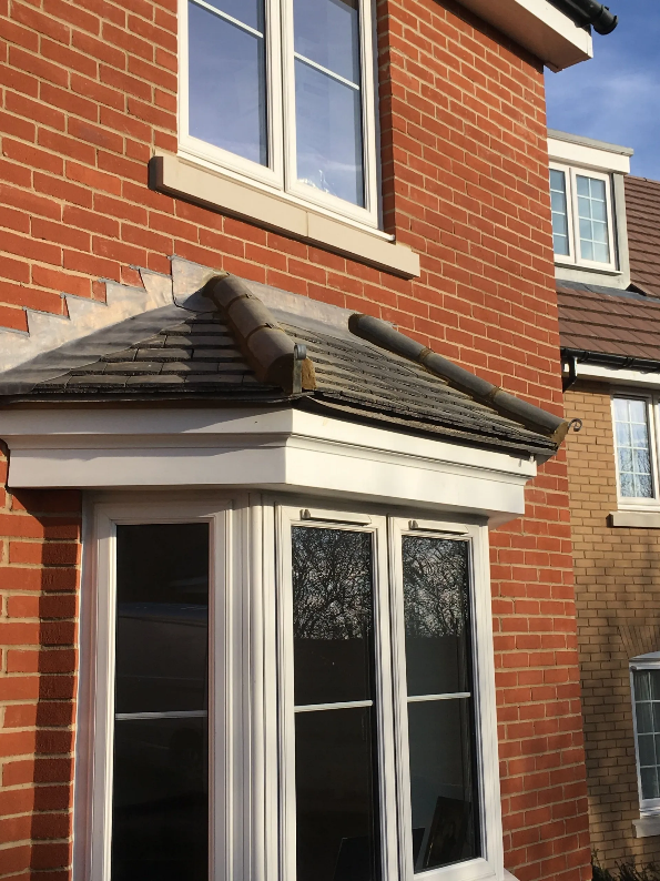 Roofing tile over windows