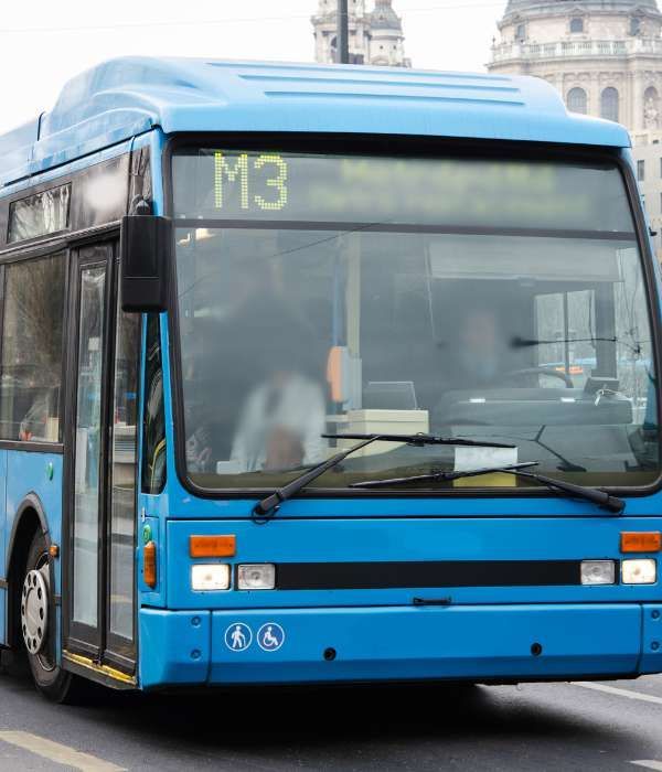 A blue bus with the number m3 on the front