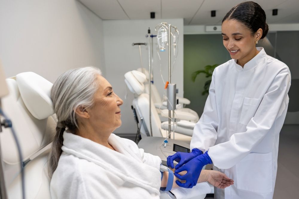 Nurse Preparing an IV on an Older Woman in a Medical Setting — Universal Nurse in Murgon, QLD
