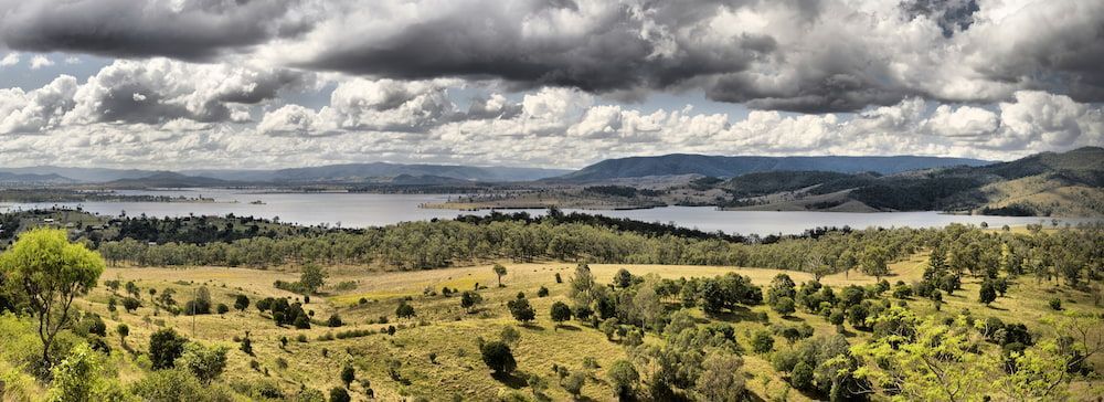 A Panoramic View Of A Lake Surrounded By Trees — Universal Nurse in Kilcoy, QLD