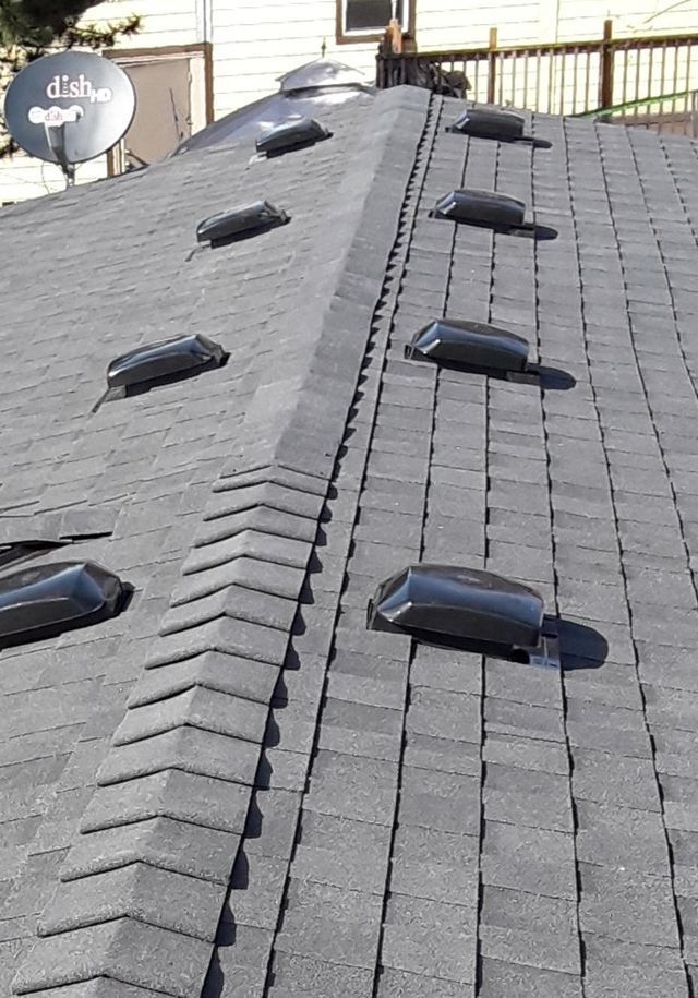 a roof with a lot of vents on it