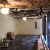 There is a lot of insulation in the ceiling of this room.