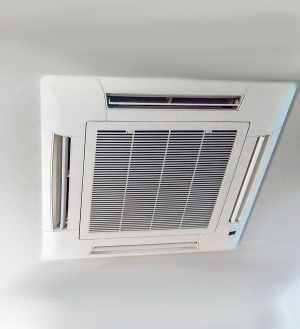 A White air Conditioner is Hanging from the Ceiling in a room — The Latest Home Appliances in Rockhampton