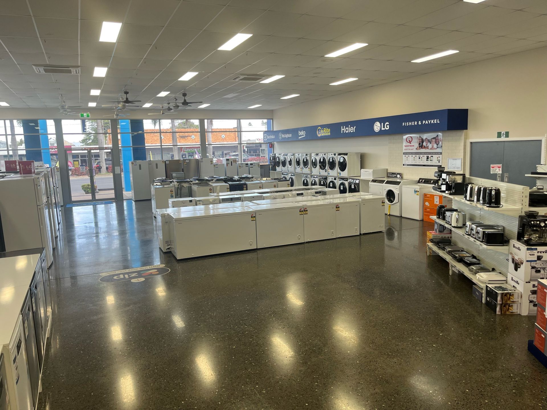TV's on Shelf with Kitchen Appliances — The Latest Home Appliances in Rockhampton