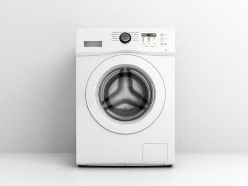 A White Washing Machine is Sitting in front of a White wall — The Latest Home Appliances in Rockhampton