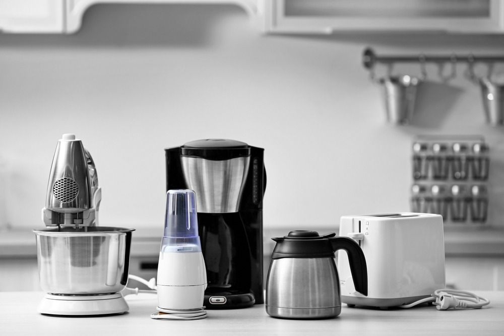 A Black and White photo of Various Kitchen Appliances on a Counter — The Latest Home Appliances in Rockhampton