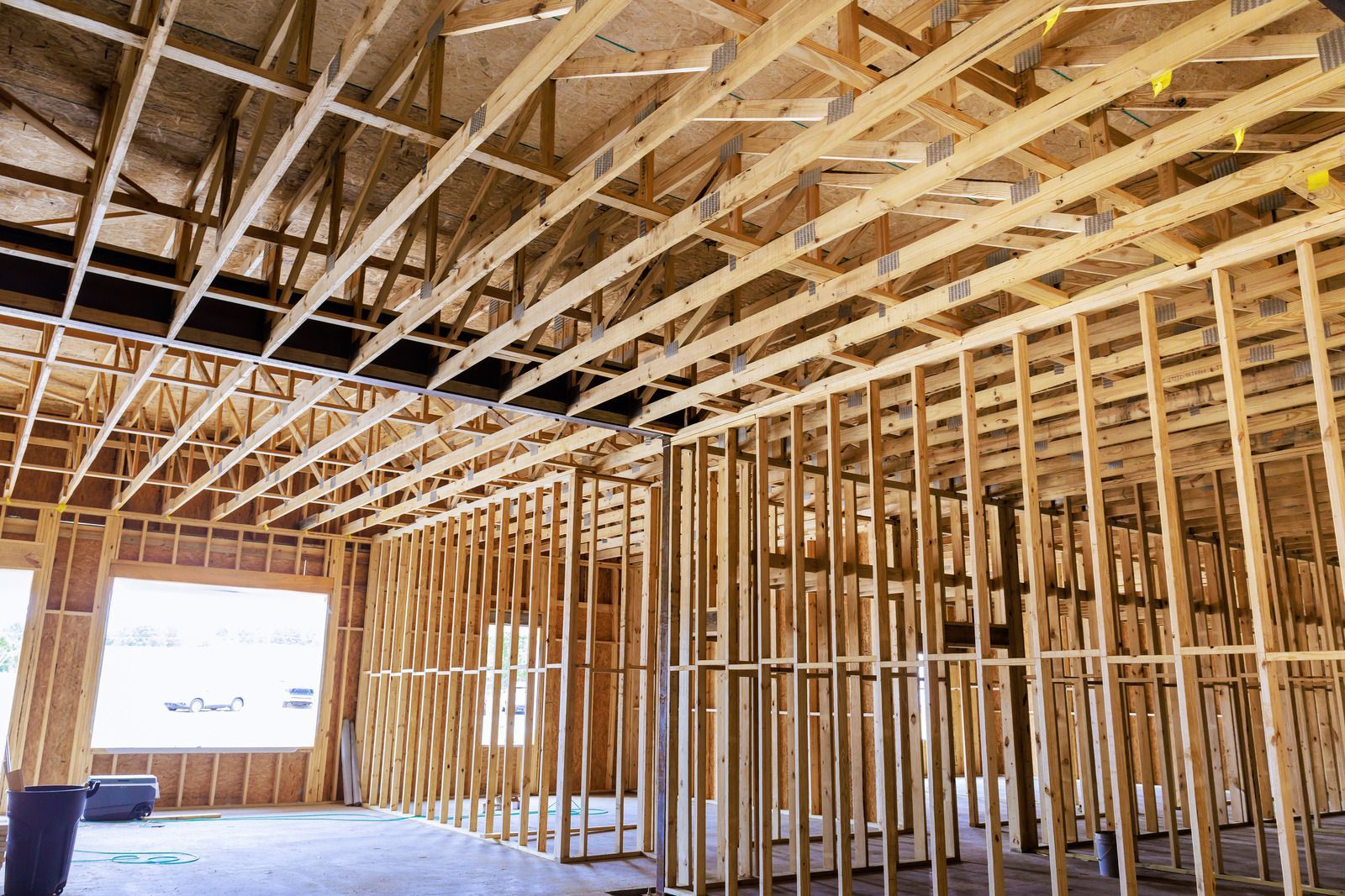 A wooden fence with a gate attached to it.