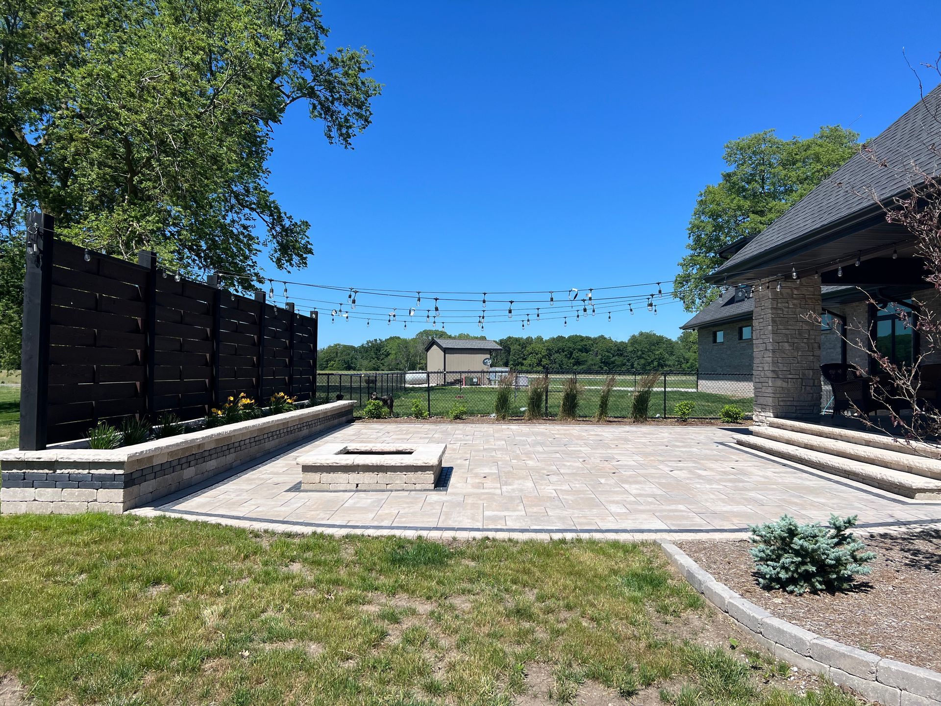 Hardscape installation project by Harkins Unique Landscapes — stonework in central Illinois