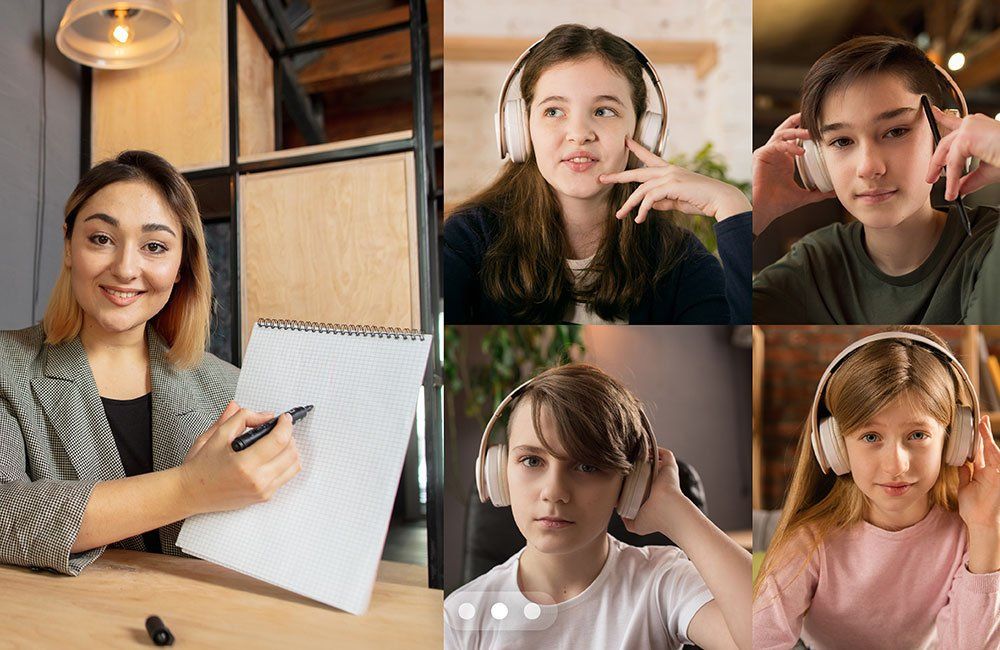 A group of children wearing headphones are having a video call with their teacher.