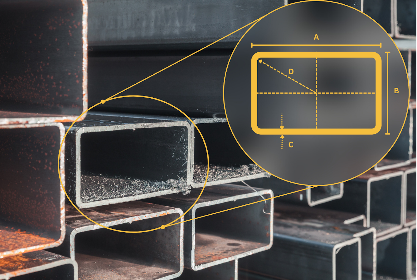 A close up of a stack of metal pipes with measurements on them.