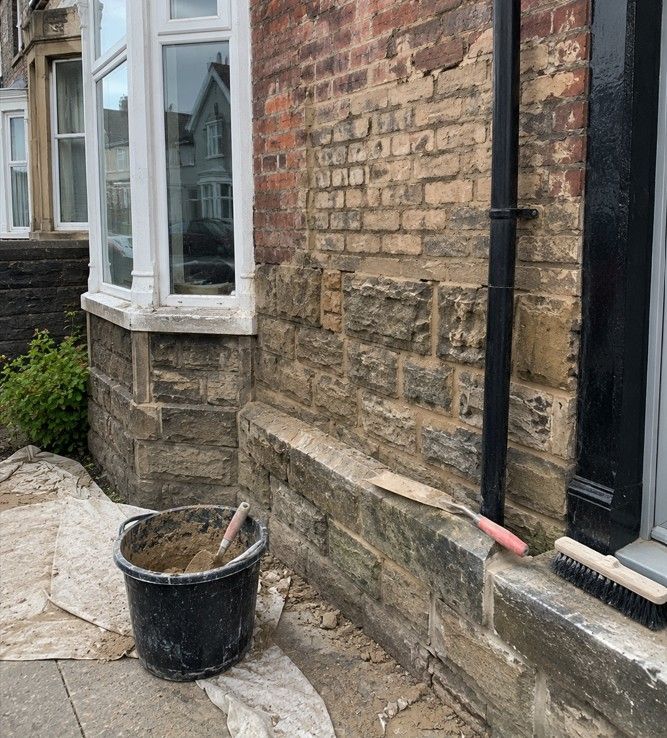 J&Z Property Maintenance builders carrying out structural repairs and brickwork in Barry