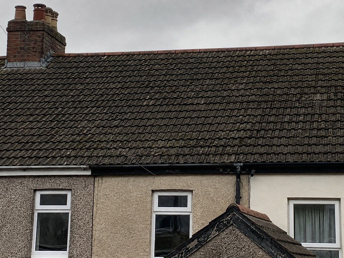 roof with replacement tiles in Barry