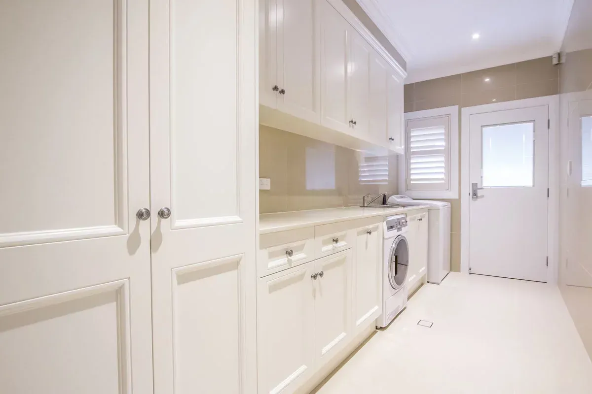 Sleek and Modern White Laundry Room Design | North Richmond, NSW | Pace Kitchens