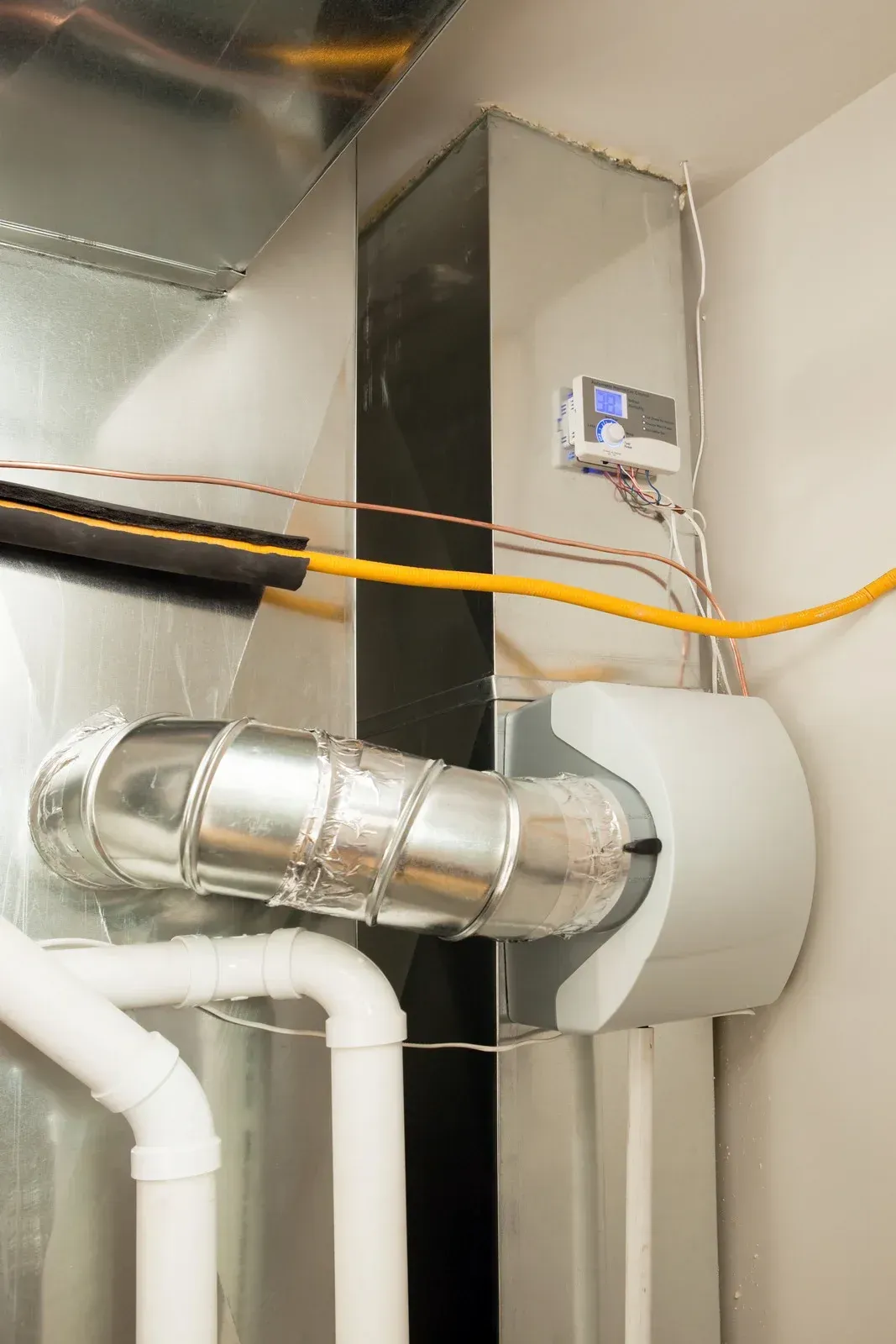A close up of a ventilation system in a house.
