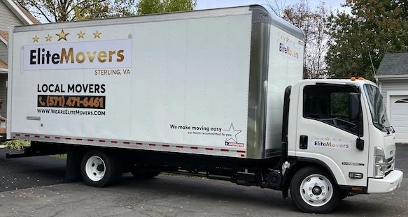 a white truck is parked in the driveway