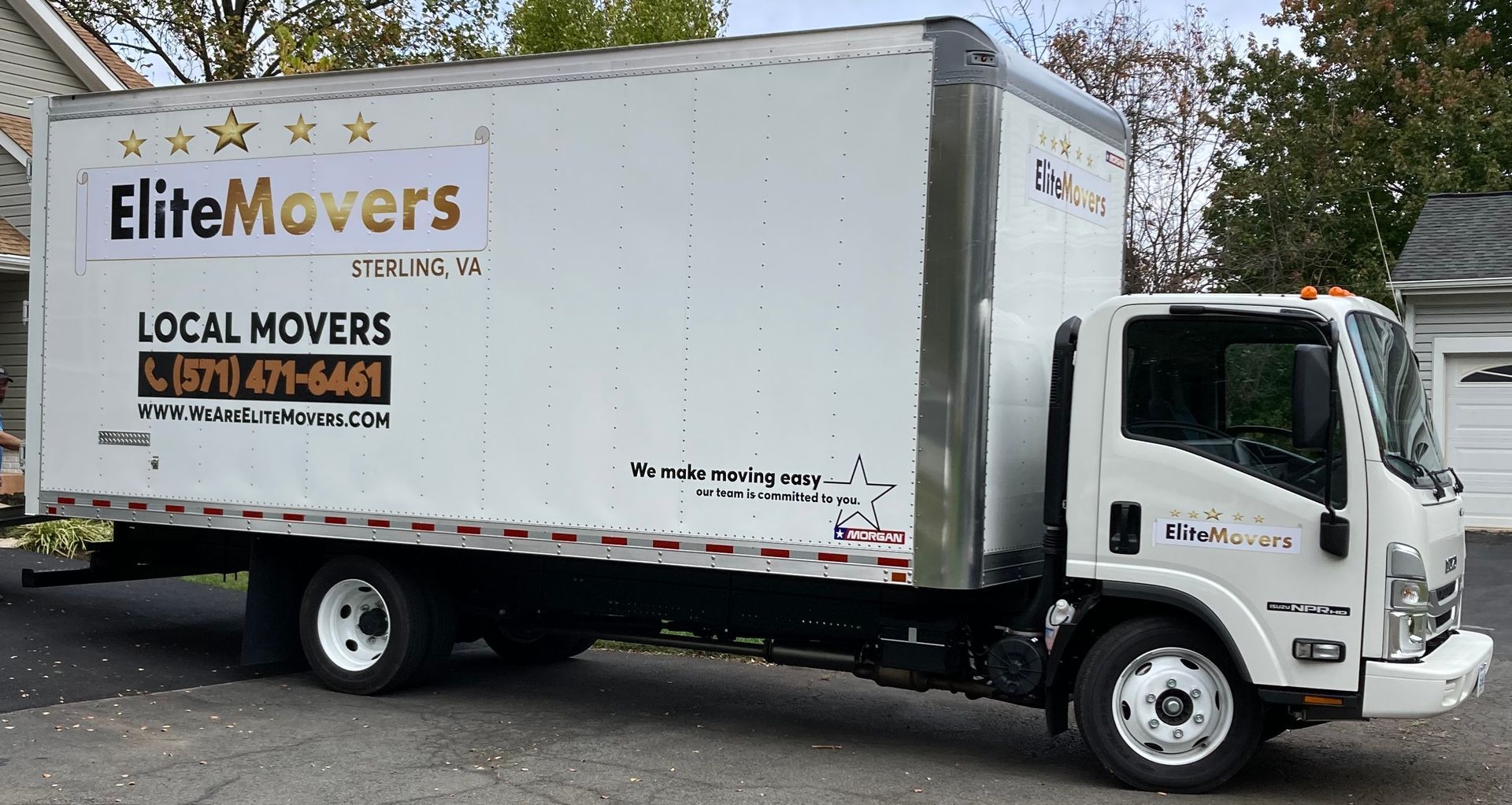 Elite movers truck is parked ready to get loaded 