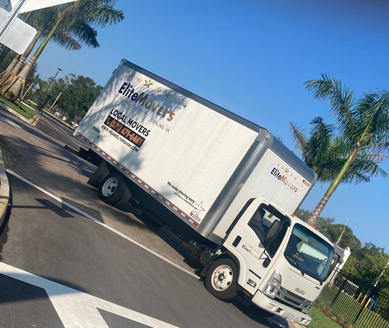 moving truck is parked in the street
