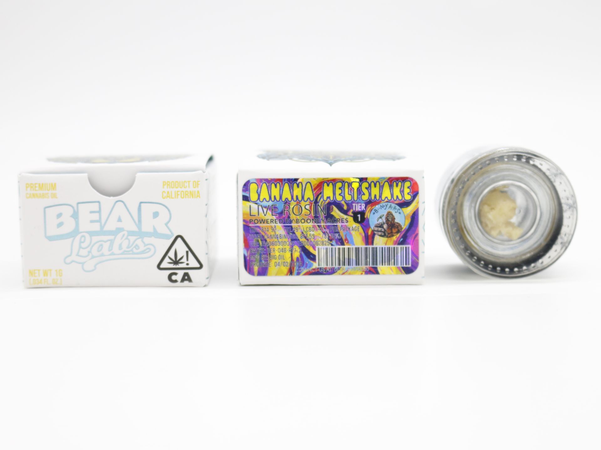 A box of bear labs next to a jar of Banana Meltshake