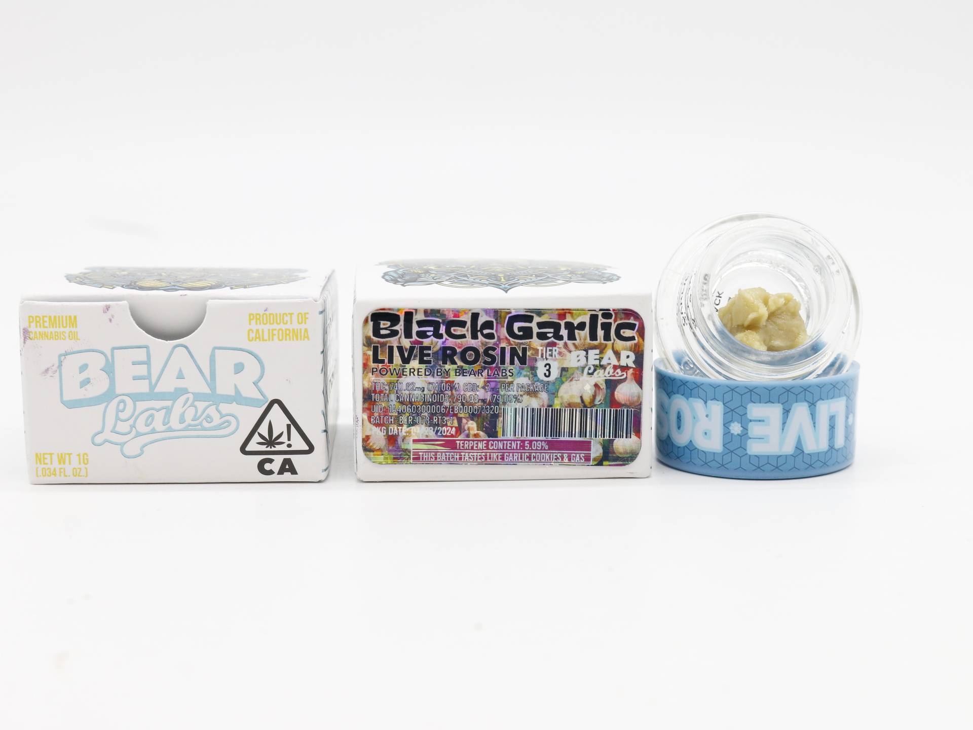 A box of bear labs next to a jar of Black Garlic