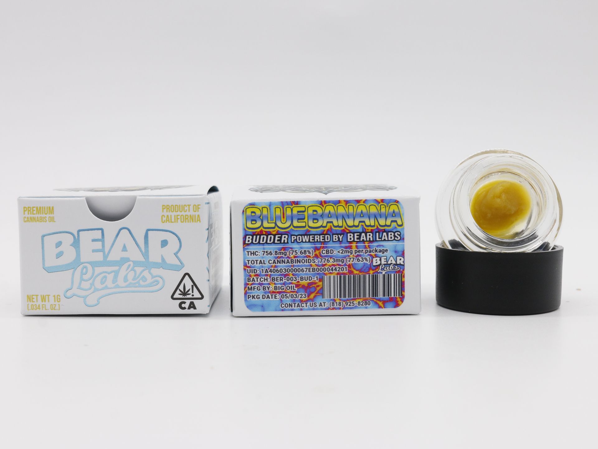 A box of bear balls and a jar of bear balls are sitting on a table.