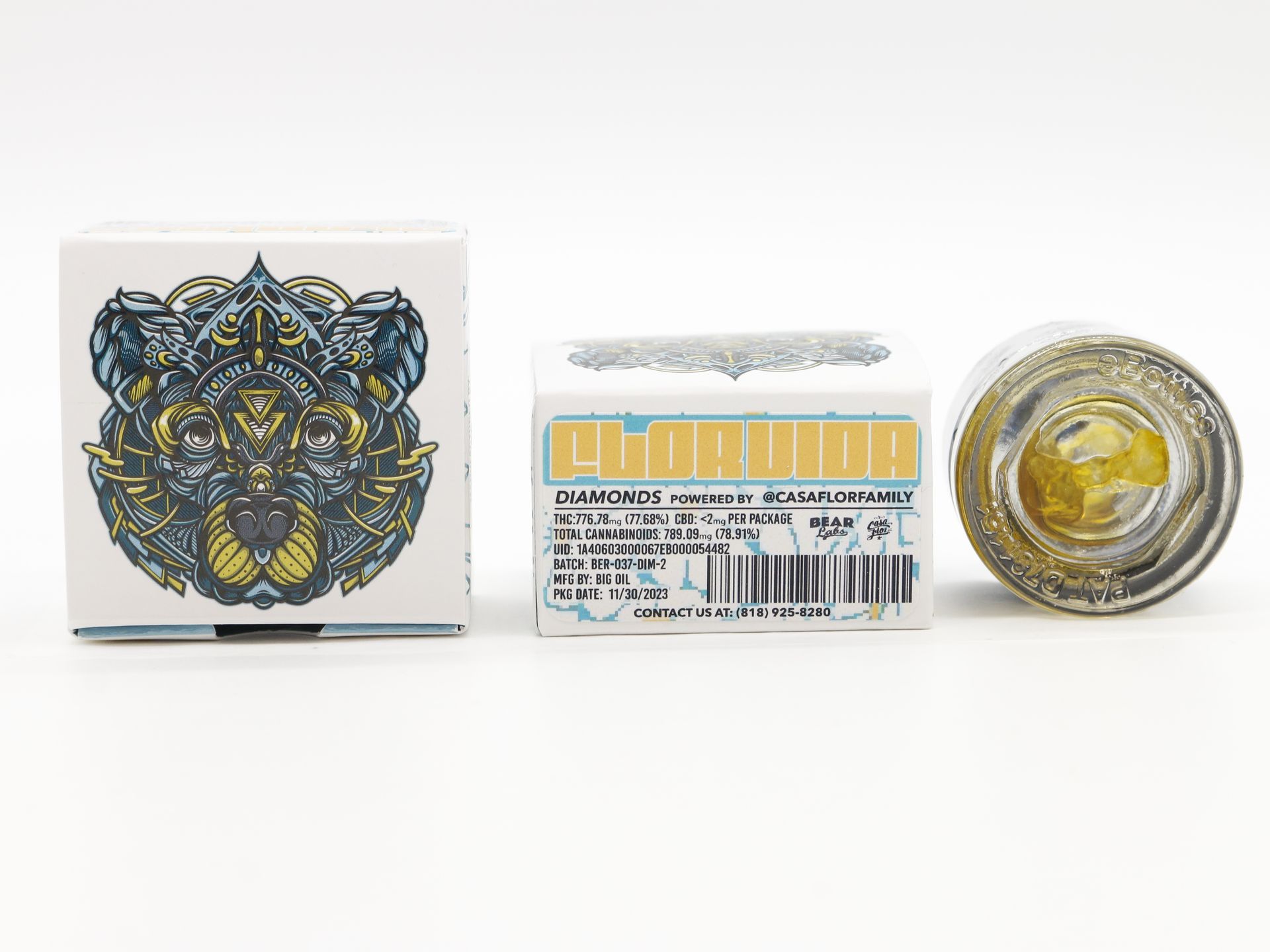 A box of bear labs next to a jar of Flor Vida