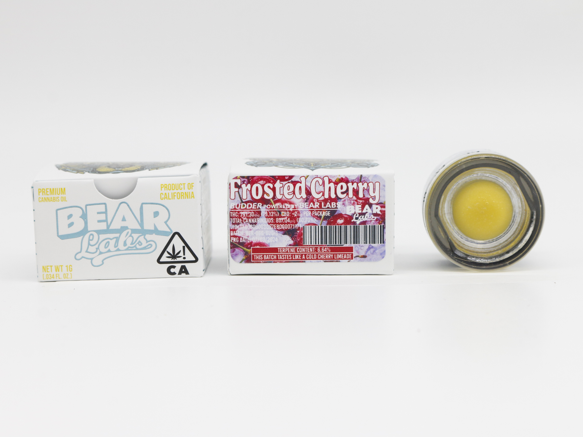 A box of bear labs next to a jar of Frosted Cherry