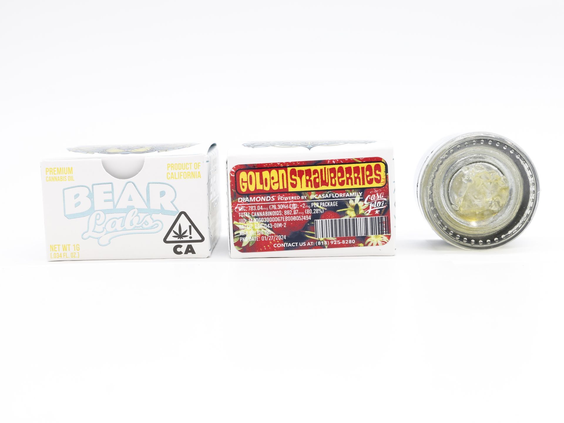 A box of bear labs next to a jar of Golden Strawberries